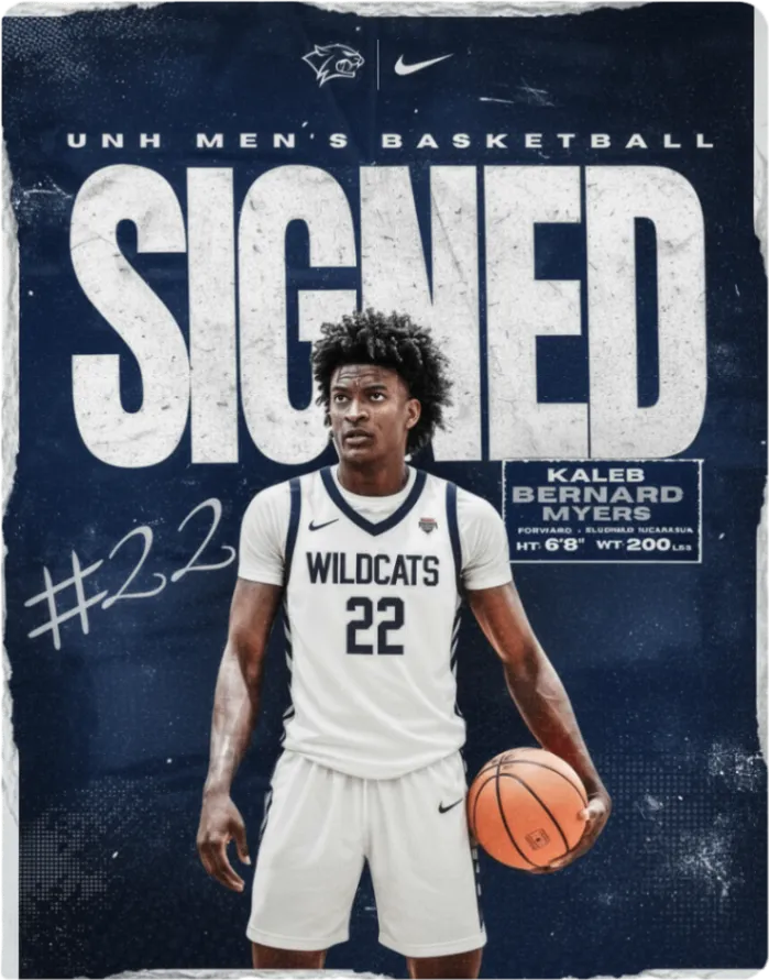 Kaleb Myers in the white UNH Wildcats number 22 jersey